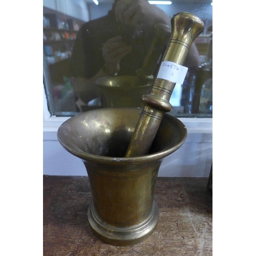 799 - A brass pestle and mortar