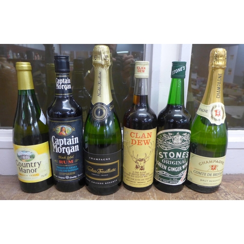 806 - Six bottles of vintage alcohol including rum, whisky and champagne