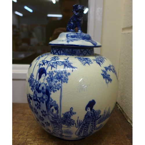 810 - An oriental blue and white lidded jar