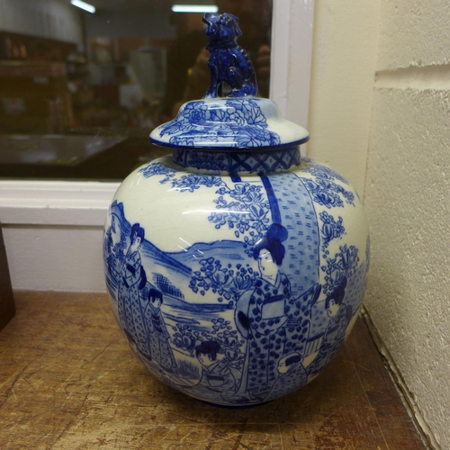 810 - An oriental blue and white lidded jar