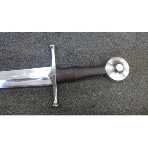 816 - A reproduction sword with scabbard and an Indian sword