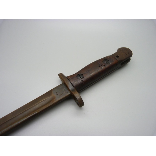 831 - A bayonet with scabbard