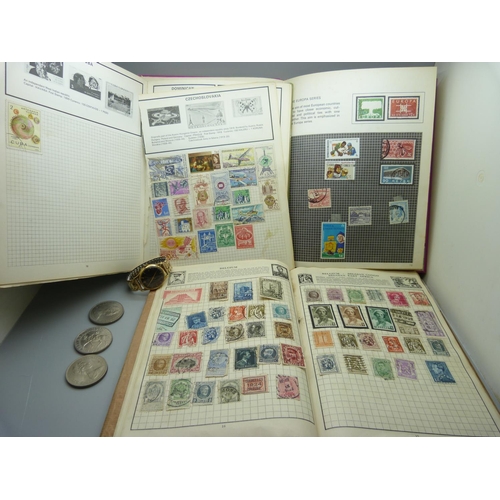 832 - Three stamp albums, two from 1937 and one from 1980's, three coins and a Smiths De Luxe wristwatch, ... 