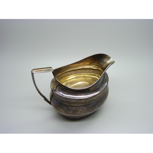 836 - A George III silver cream jug, London 1801, 144g, repaired