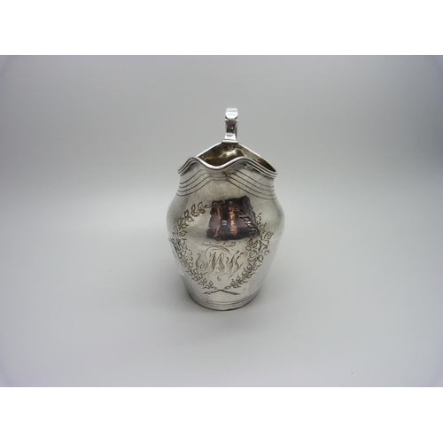 844 - A George III silver jug, London 1800, 84g