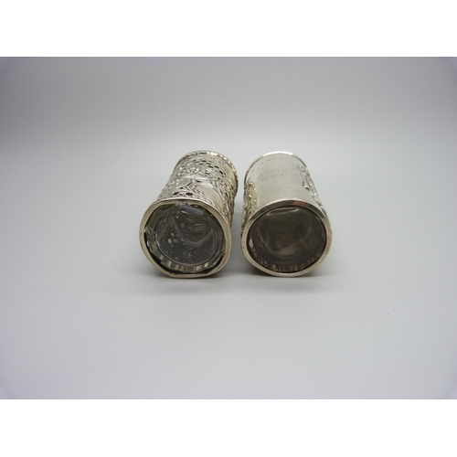 846 - Two silver topped glass bottles including one Victorian, both in hallmarked silver holders, weighabl... 