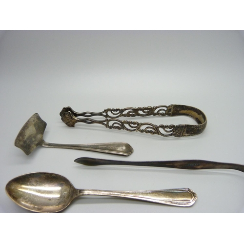 861 - Silver items including Georgian sugar bows, 158g