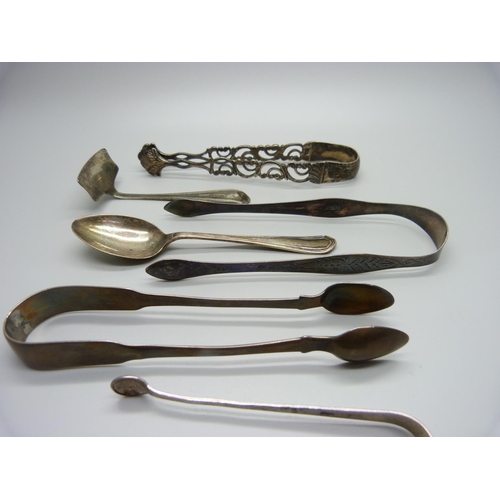 861 - Silver items including Georgian sugar bows, 158g