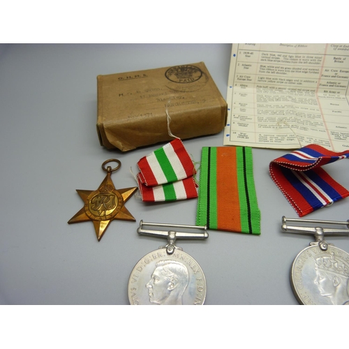 872 - A collection of five WWII medals, box addressed to Quinn, Manchester