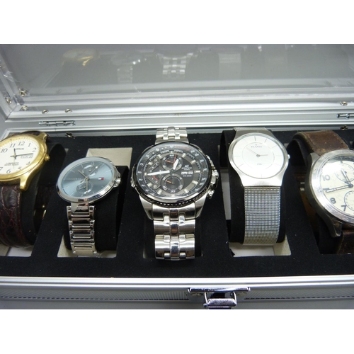 895 - A case of six wristwatches; Hilfiger, Skagen, Casio, etc.