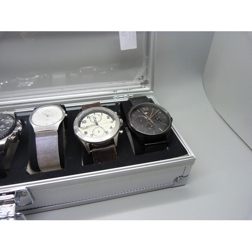 895 - A case of six wristwatches; Hilfiger, Skagen, Casio, etc.