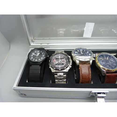 896 - A case of six wristwatches, Casio, Sekonda, Hilfiger and Accurist