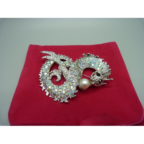 900 - A large dragon brooch