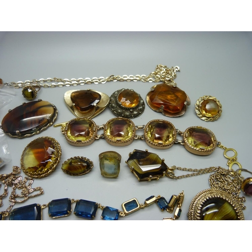 907 - A collection of stone set gold tone jewellery