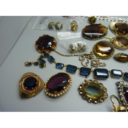 907 - A collection of stone set gold tone jewellery