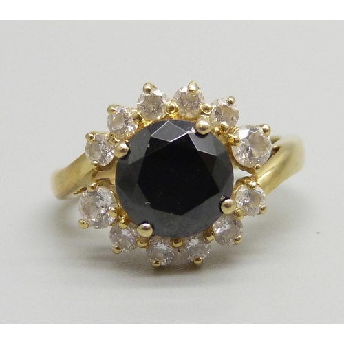 916 - A gold, sapphire and CZ ring, 3.8g, L