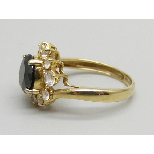 916 - A gold, sapphire and CZ ring, 3.8g, L