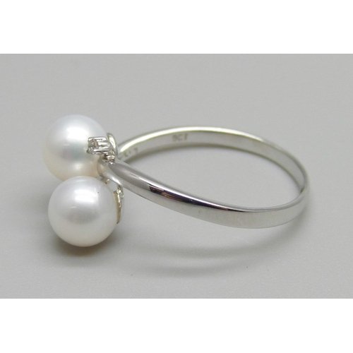 919 - A 9ct white gold, pearl and diamond ring, 2.1g, N