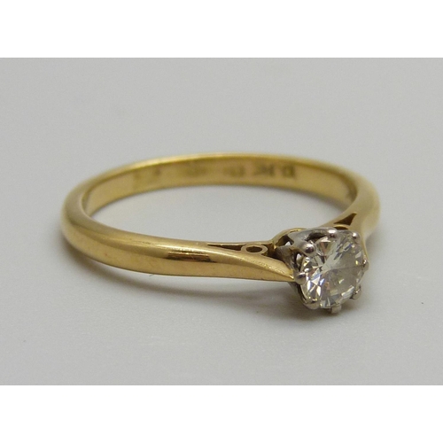 921 - An 18ct gold and diamond solitaire ring, approximately 0.32 carat diamond weight, 2.7g, N