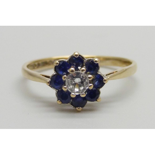 925 - A 9ct gold, blue and white stone cluster ring, 1.6g, N