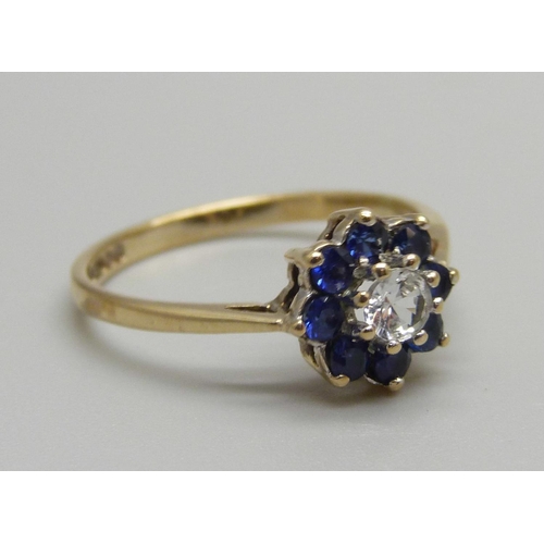 925 - A 9ct gold, blue and white stone cluster ring, 1.6g, N