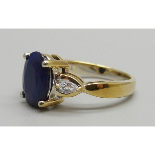 930 - A silver gilt, sapphire and zircon ring, L