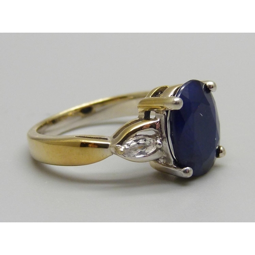 930 - A silver gilt, sapphire and zircon ring, L