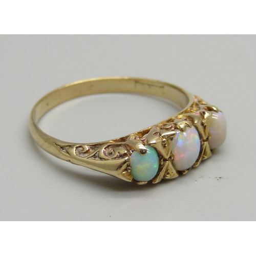 932 - A 9ct gold three stone opal ring, 2.8g, Q