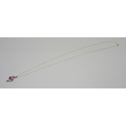 933 - A 9ct gold, ruby and diamond pendant on chain, 1.2g