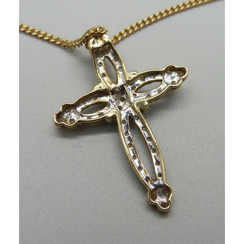 937 - A 9ct gold cross pendant set with approximately 44 diamonds, on a 9ct gold chain, total weight 6.9g