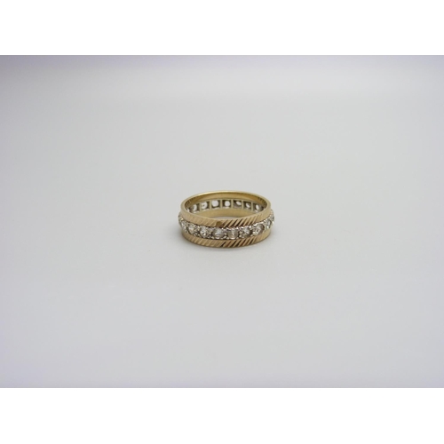 953 - A 9ct gold eternity ring, 2.9g, L