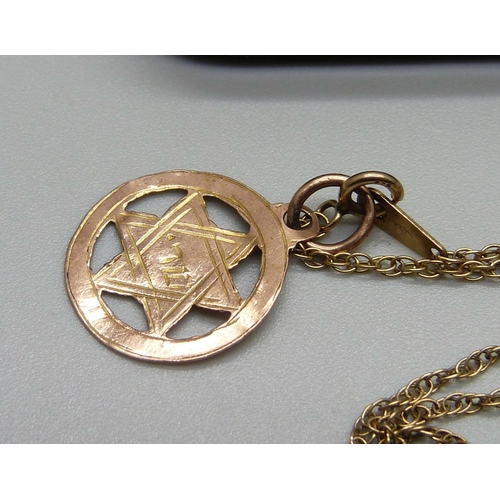 956 - A 9ct gold Star of David pendant and chain, 2g