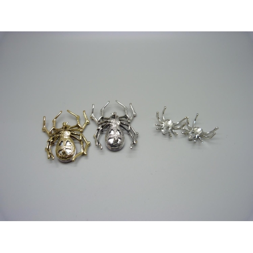 958 - Two spider brooches and a pair of spider earrings