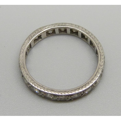 965 - A platinum and diamond eternity ring, with copy of insurance valuation dated 2016 for £4.500, 4.2g, ... 