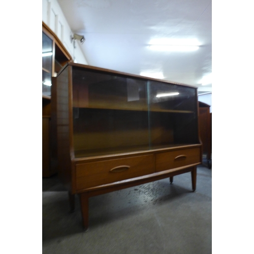 11 - A Jentique teak bookcase