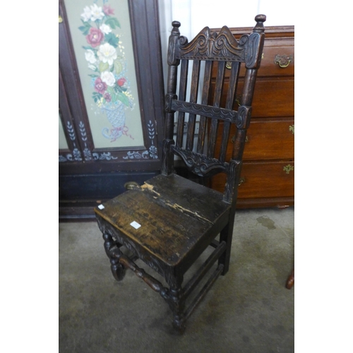 110 - A Charles I carved joint oak side chair