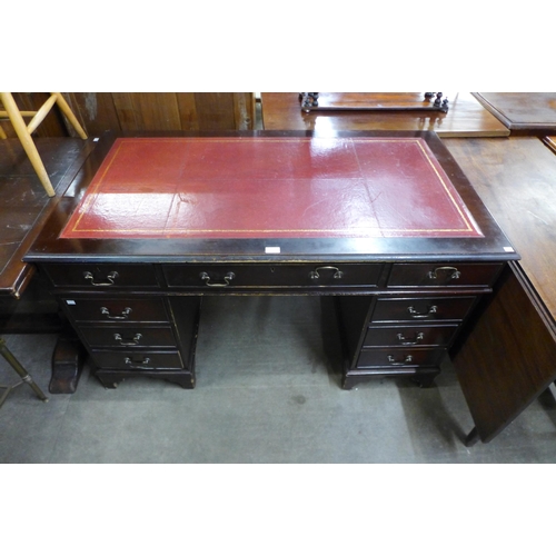 127 - A mahogany pedestal desk