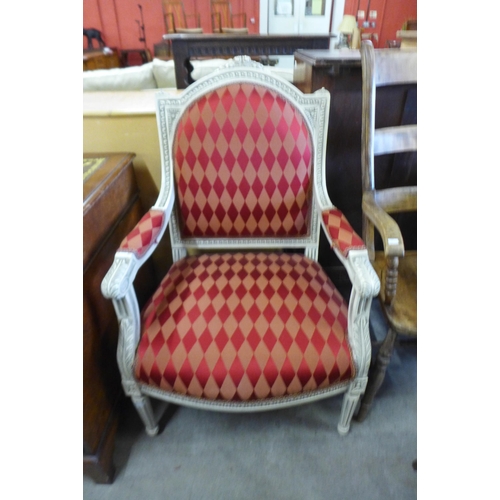 145 - A French 19th Century style cream and upholstered armchair