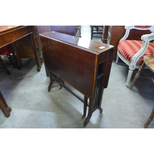 147 - An Edward VII inlaid mahogany Sutherland table