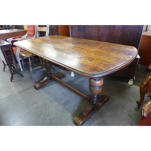 148 - An oak refectory table