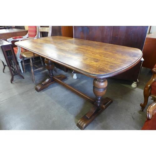 148 - An oak refectory table