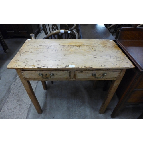 162 - A Victorian pine two drawer side table