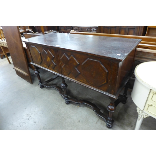 164 - A Jacobean Revival geometric inlaid walnut dresser