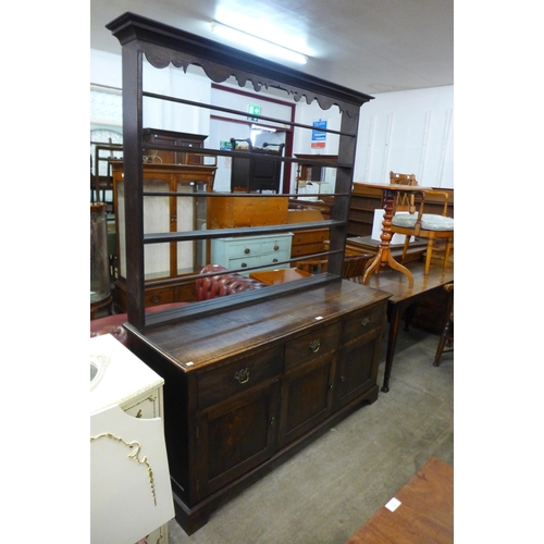 166 - A George III style oak dresser