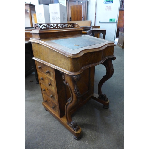 168 - A Victorian walnut Davenport