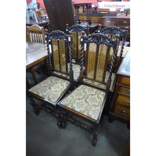 178 - A set of four oak barleytwist bergere dining chairs