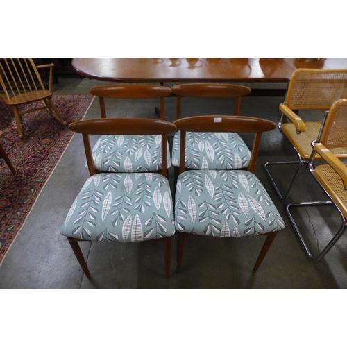 20 - A set of four teak dining chairs