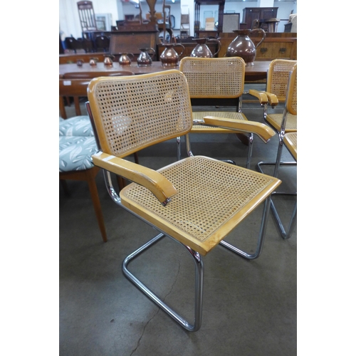 21 - A set of three Mercel Breuer style beech, chrome and bergere cantilever armchairs and another simila... 
