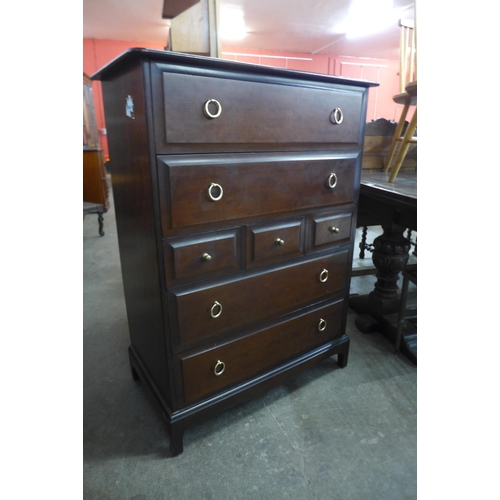 214a - A Stag Minstrel mahogany chest of drawers