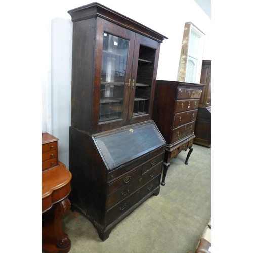 219 - A George III oak bureau bookcase